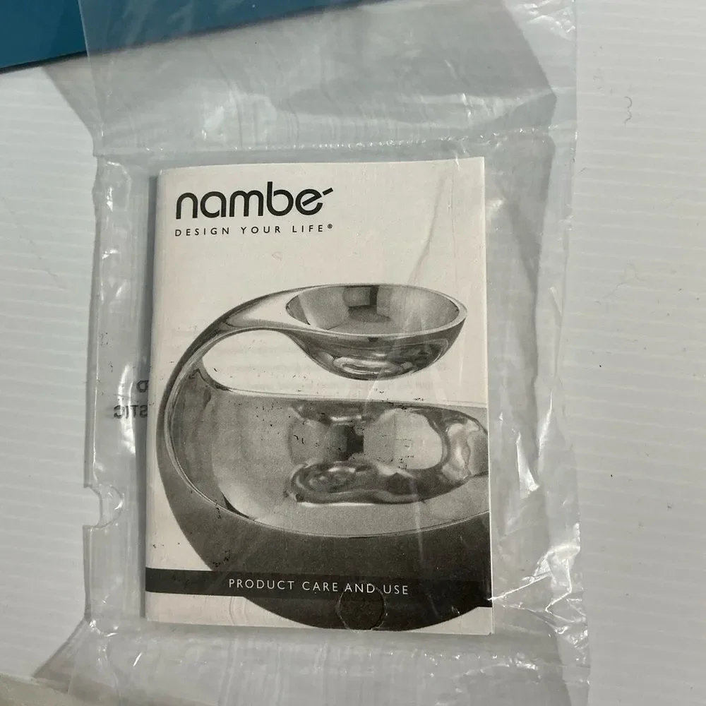Nambé 10-inch handled bowl, designed by Neil Cohen new in box